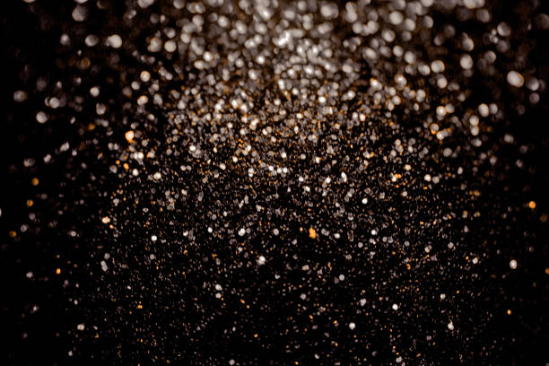 istock Black glitter sparkle background. Black friday shiny pattern with sequins. Christmas glamour luxury pattern, black christmas and glitter diamond background. Dark silver pattern. 874473458
