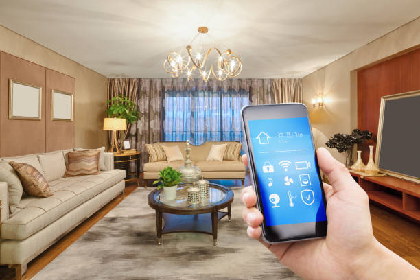 istock smart phone with smart home with modern living room 874473592