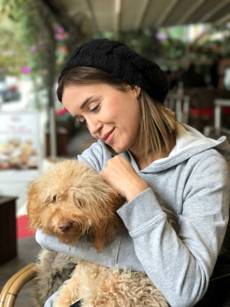 istock Girl with puppy 874474548