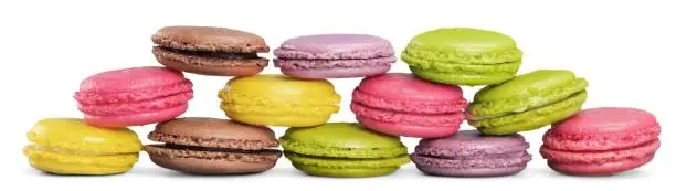 Pyramid of pastel macaroons on white background