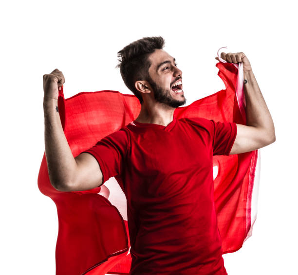 istock Swiss athlete / fan celebrating on white background 874481704