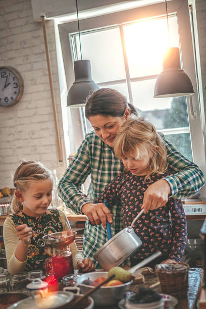 istock Preparing Homemade Berry Jam and Canning in Jars 874486766