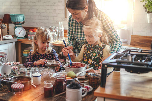 istock Preparing Homemade Berry Jam and Canning in Jars 874486772
