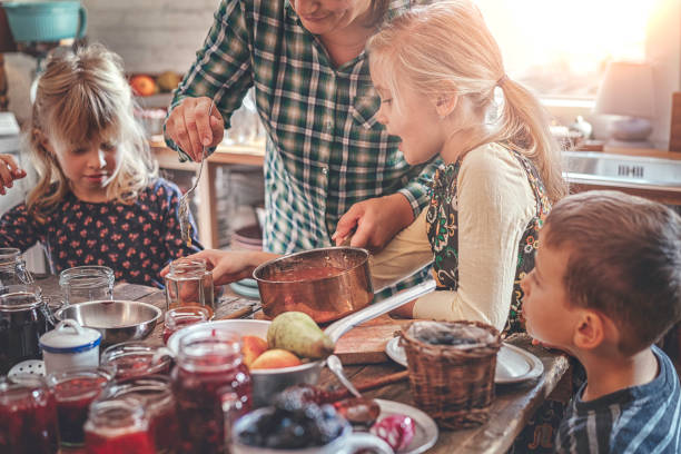 istock Preparing Homemade Apricot Jam and Canning in Jars 874486776