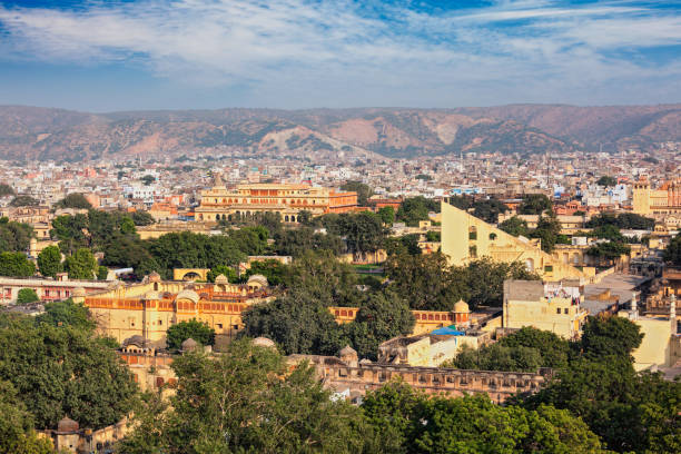 Panorama of aerial view of Jaipur (Pink city) - Hawa Mahal (Palace of Winds or a Palace of the Breeze ) and Jantar Mantar observatory. Jaipur, Rajasthan, India