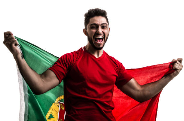 istock Portuguese athlete / fan celebrating on white background 874497466