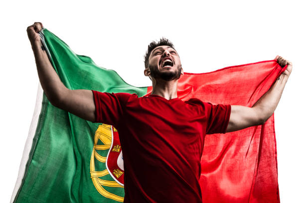 istock Portuguese athlete / fan celebrating on white background 874497470