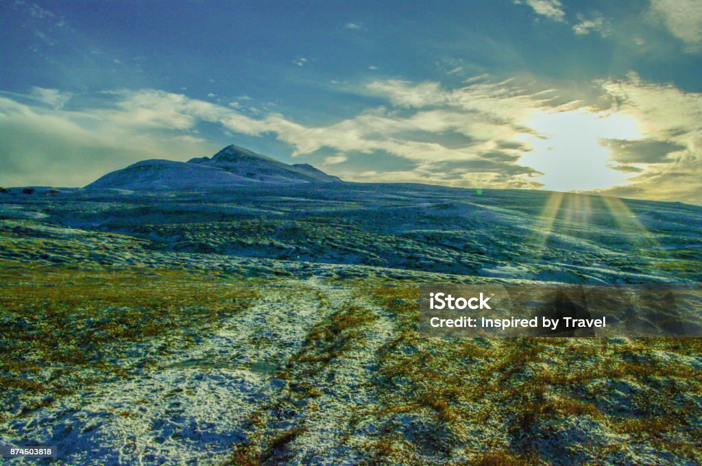 Sunlight in the mountains Sunlight in the mountains in Iceland in wintertime Akureyri Stock Photo