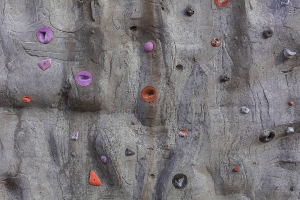 istock Colorfull indoor rock climbing wall 874504528