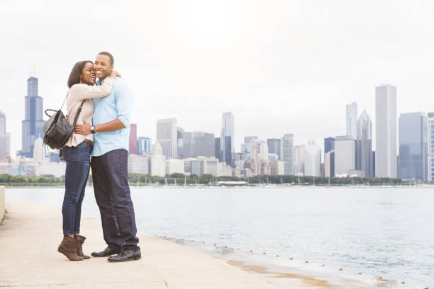 istock Happy black couple embracing in Chicago 874507938
