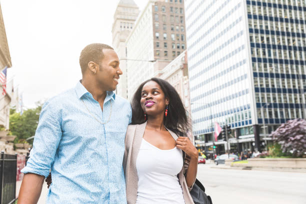 istock Happy black couple walking in Chicago 874508006