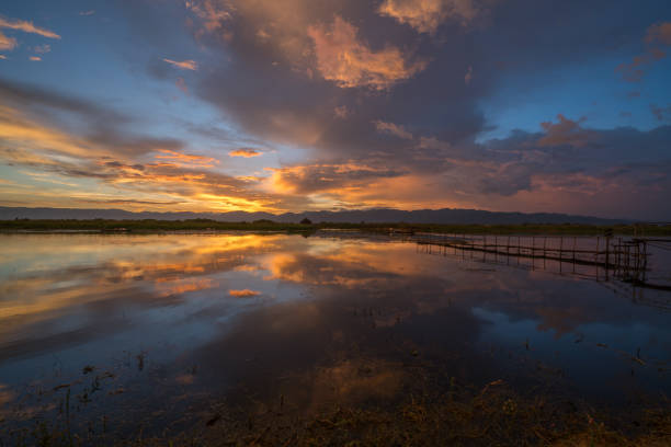 istock Stunning sunset over Inle lake, Myanmar 874508478