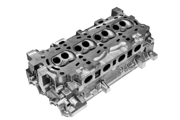 istock The cylinder head of the internal combustion engine. Isolated on white background 874514426