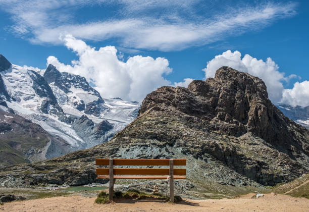 istock View point and wooden bench at a mountains 874515152