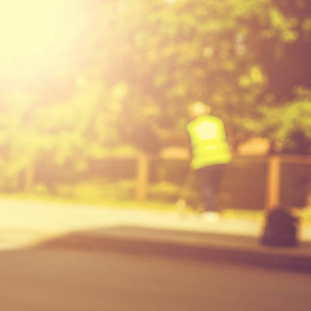 istock Abstract blurred background  - road sweeper worker cleaning city street with broom tool 874515706