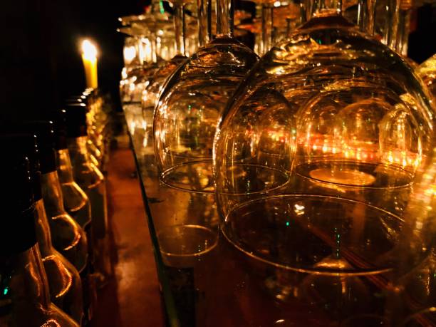 istock raw of glasses in a Bar I 874518882