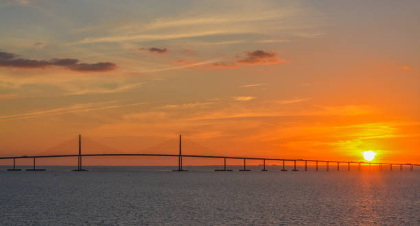 istock Sunshine Skyway Bridge Silhouette on Tampa Bay, Florida 874522068