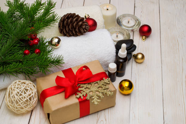 istock spa concept, wellness objects on wood plant , christmas background. Present holiday 874522182
