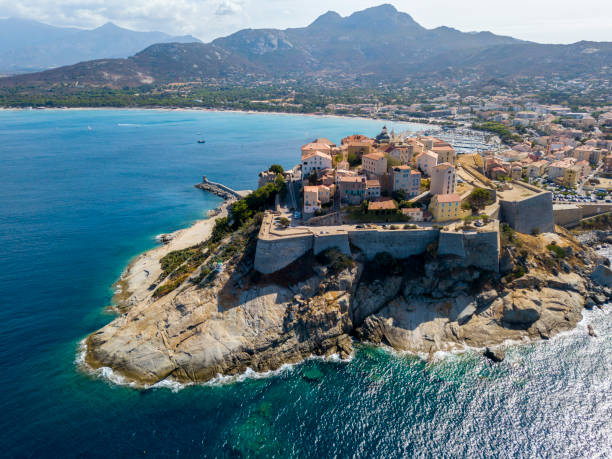 Aerial view of Calvi city, Corsica, France Aerial view of Calvi city, Corsica, France. Walls of the city, cliff overlooking the sea corsica photos stock pictures, royalty-free photos & images