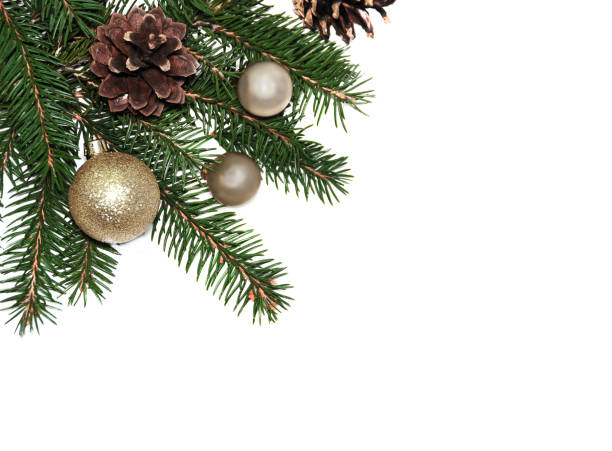 istock Christmas frame background from xmas tree and golden balls isolated on the white table and copy space for holiday text. 874531388