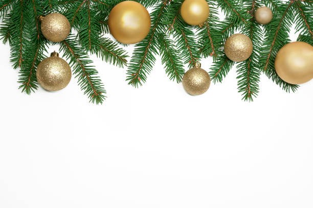 istock Christmas frame background from xmas tree and golden balls isolated on the white table and copy space for holiday text. 874533256