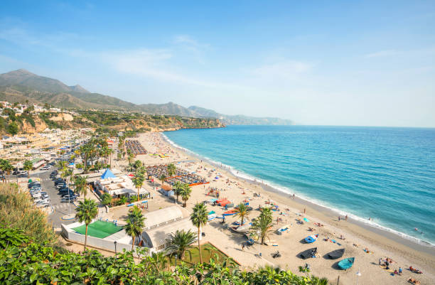 Nerja beach. Malaga province, Costa del Sol, Andalusia, Spain View of beach in Nerja. Malaga province, Costa del Sol, Andalusia, Spain costa del sol málaga province photos stock pictures, royalty-free photos & images