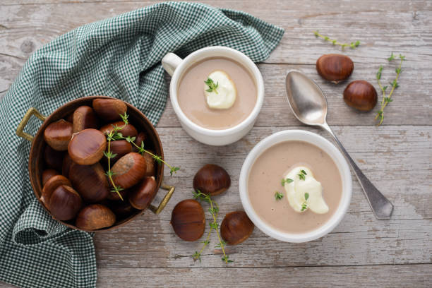 chestnut soup on wood background - chestnut imagens e fotografias de stock