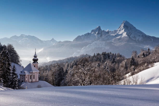 Maria Gern Church with Watzmann in winter, Berchtesgadener Land, Bavaria, Germany Snow, Winter, Cathedral, Chapel, Church, Berchtesgande, Alps bavarian forest stock pictures, royalty-free photos & images