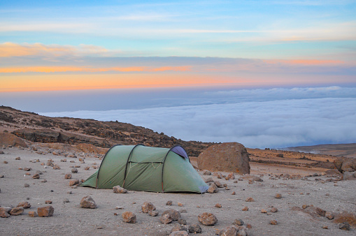 A tent with a view over the clouds from Kibo hut on Mount Kilimanjaro, Tanzania.