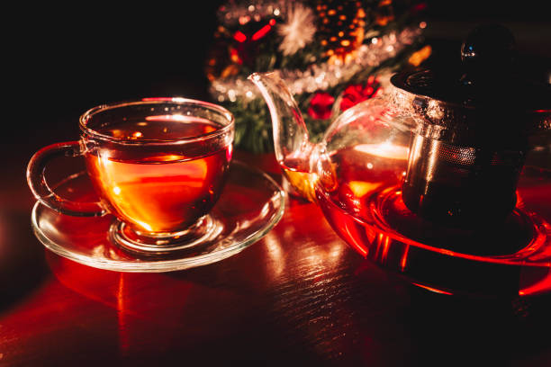 istock Cup of tea and teapot on wooden table 874565898