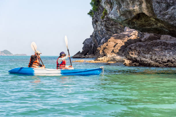 istock Mother and daughter on kayak 874569908