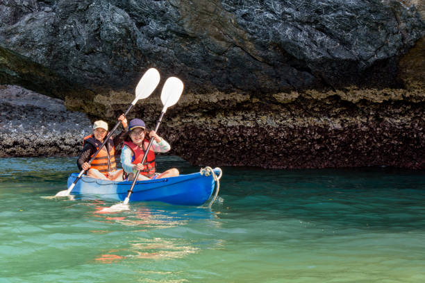 istock Mother and daughter on kayak 874569980