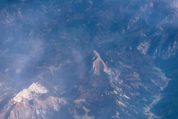 Aerial view of peak in mountain range.