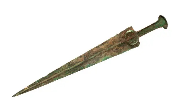 Photo of Ancient bronze sword isolated on white background. Clipping path.