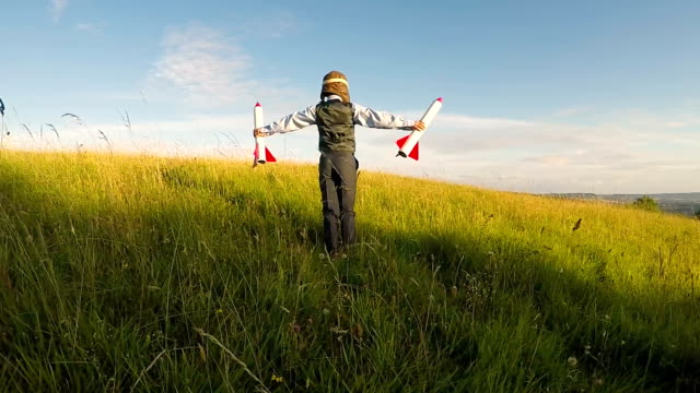 Young Business Boy with Rockets in England