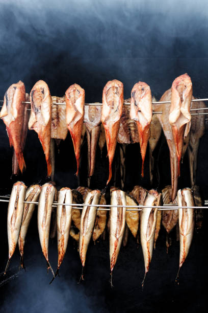smoked fisch  - halibut flatfish fish hanging stock-fotos und bilder