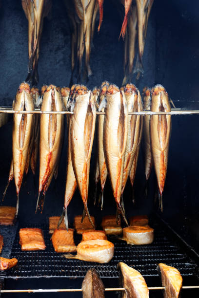 smoked fisch  - halibut flatfish fish hanging stock-fotos und bilder