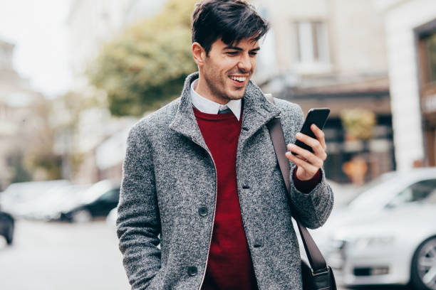 istock Man texting in the city 874597144