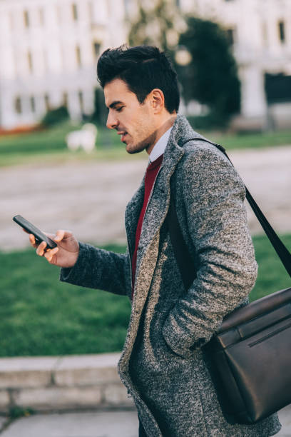 istock Man texting in the city 874597146