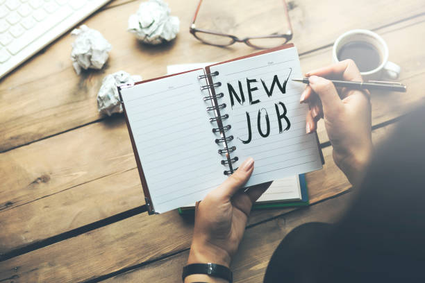 istock woman written new job text 874600086