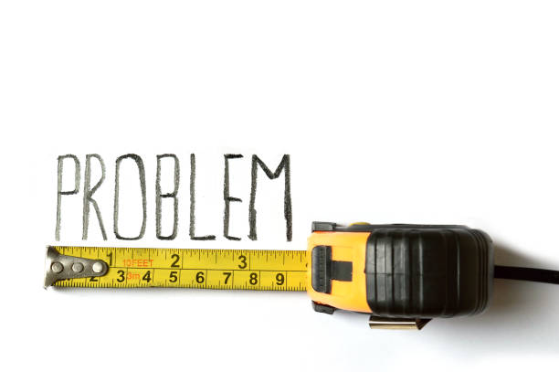 istock Measuring tape used to measure the size of the problem 874606674