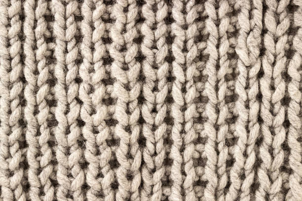 Knitted background. Knitting Pattern. Knitted texture. A sample of knitting. stock photo