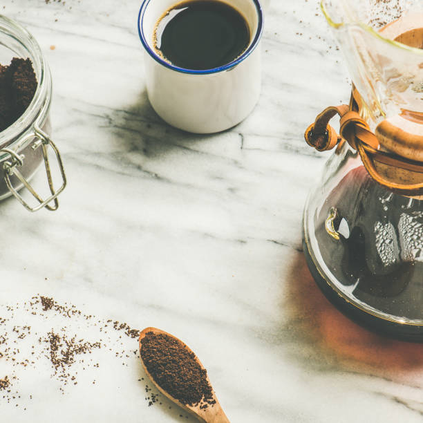 istock Black filtered coffee, square crop, copy space. Alternative brewing concept 874616856