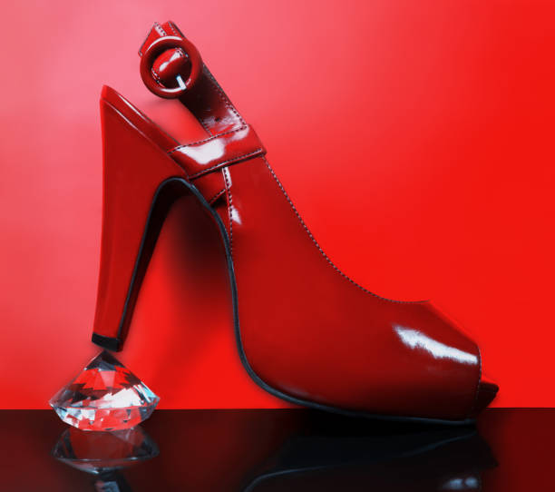 istock Red shoe standing on the diamond 874619546