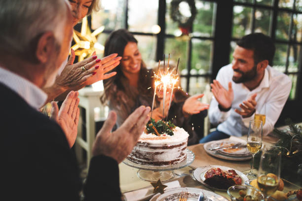 istock Family Enjoying Christmas Dinner 874620416