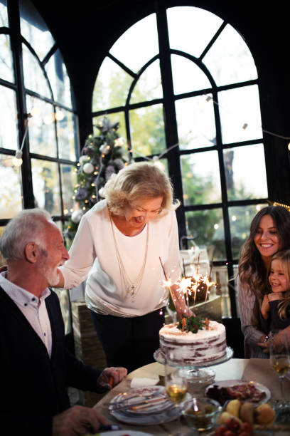 istock Family Enjoying Christmas Dinner 874620636