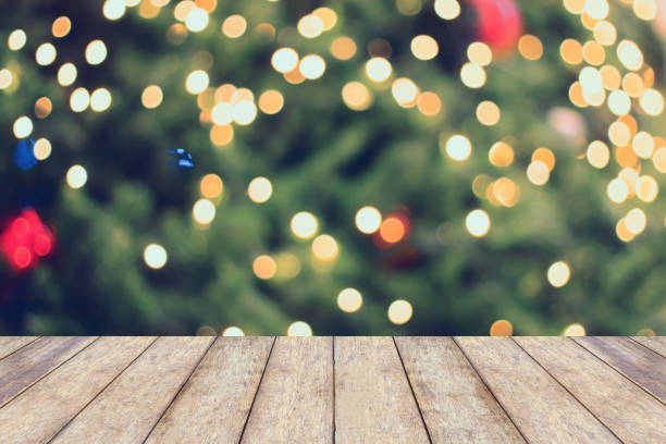 istock Christmas holiday background with empty wooden table 874632894