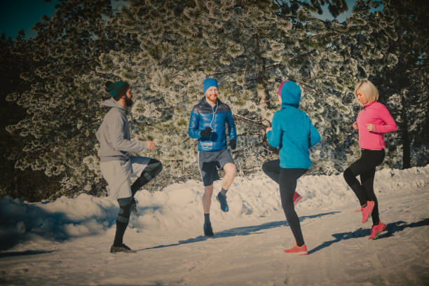 istock Sportspeople warming up on mountain 874633120