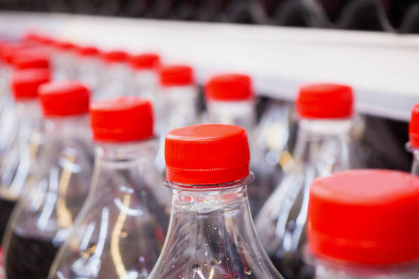 istock soft drinks bottles on shelves in supermarket 874633294