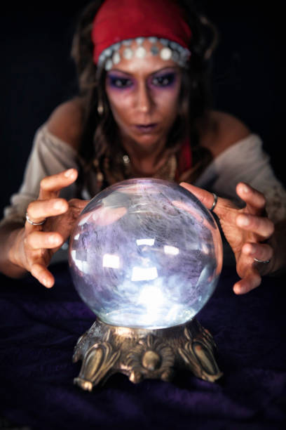 istock Gypsy looking into a Crystal Ball 874639462
